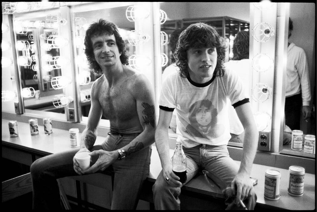 America: Bon Scott and Angus Young backstage during a 1978 tour of the United States.