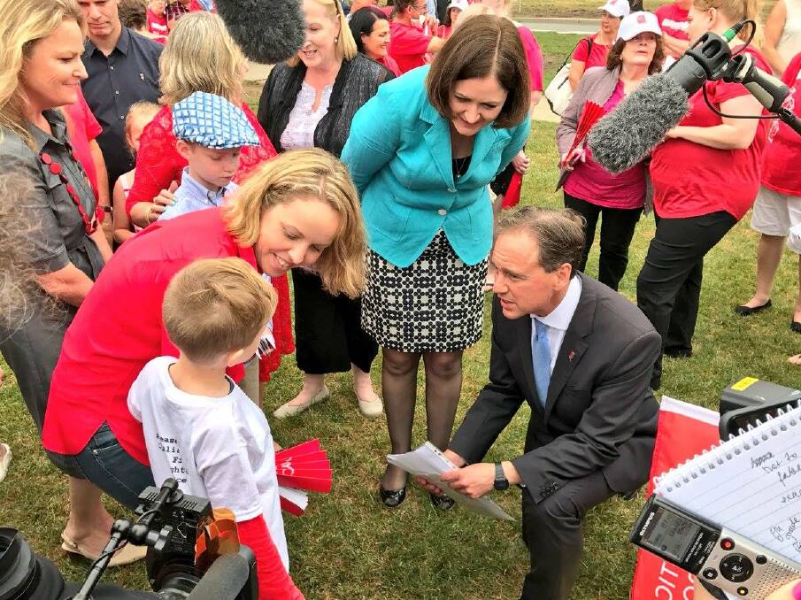 Meeting: Bunbury mother and son Oliver and Taryn Barrett with Federal Health minister Greg Hunt at the Cystic Fibrosis Australia rally in Canberra. Photo: Facebook.