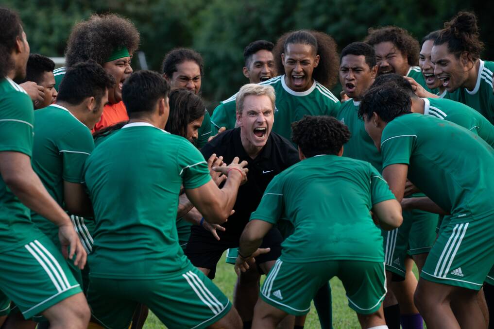 Michael Fassbender as coach Thomas Rongen with the American Samoan soccer team in Next Goal Wins. Picture Disney