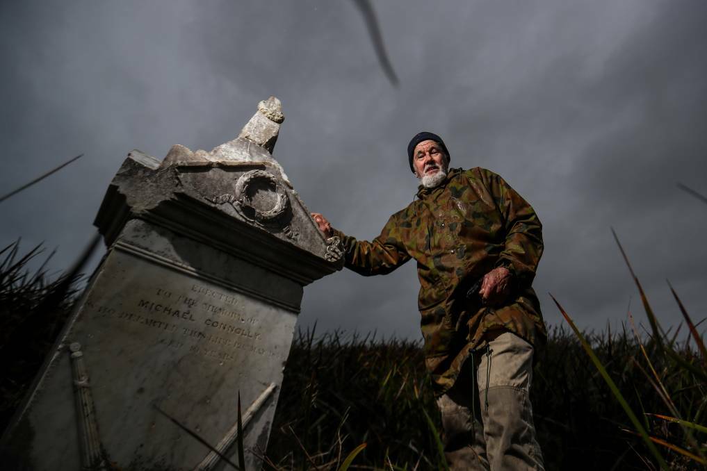 Marten Syme shows the abandoned, forgotten and overgrown Port Fairy cemetery, which is only accessible via a long walk on the beach. Photo: Morgan Hancock