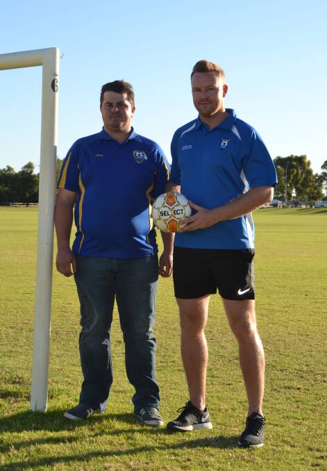 Australind Soccer Club president Steve Farmer with new coach Oliver McGee.