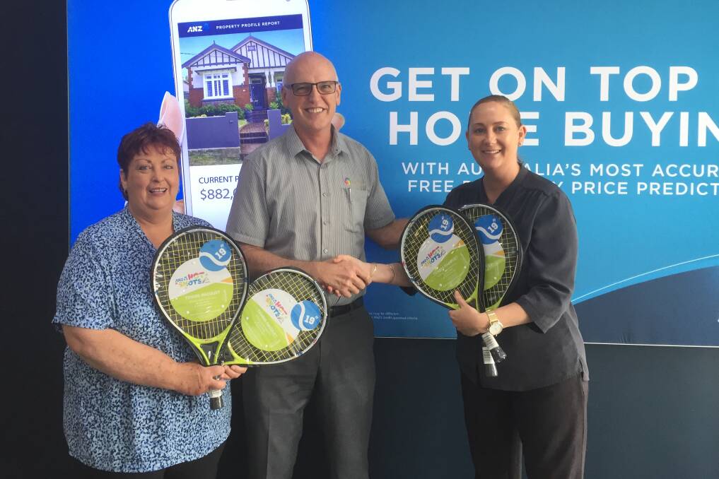 A smashing time: Bunbury Tennis Club president Jeff Glossop was elated to meet ANZ Bunbury representatives Leanne Coutts and Cara Smith earlier this week. Photo: Supplied. 