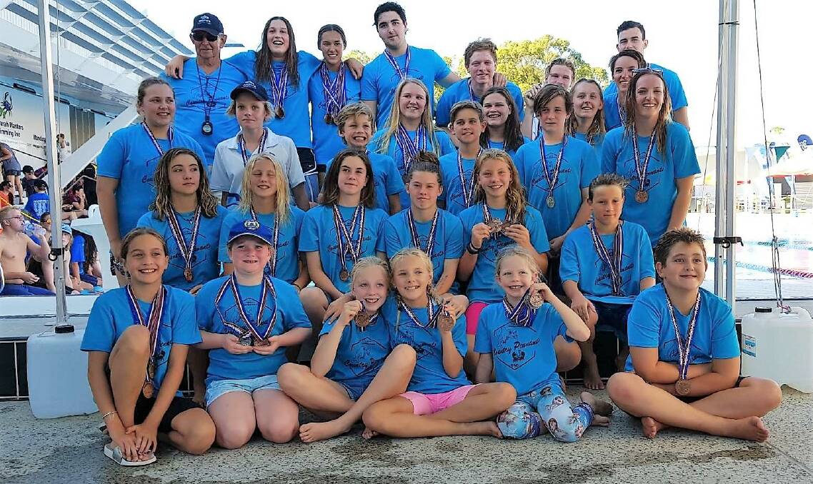 Golden performance: The Golden West Dolphins swimming team recently picked up 41 medals at the 2018 WA Country Pennants meet in Mandurah. Photo: Supplied. 