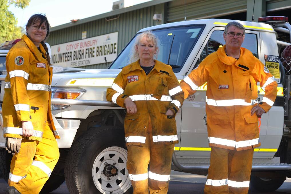 On the front line: Bunbury Volunteer Bush Fire Brigade secretary and firefighter Michelle Guerin, captain Terri Kowal, and firefighter Pat Kane. Photo: Thomas Munday.  
