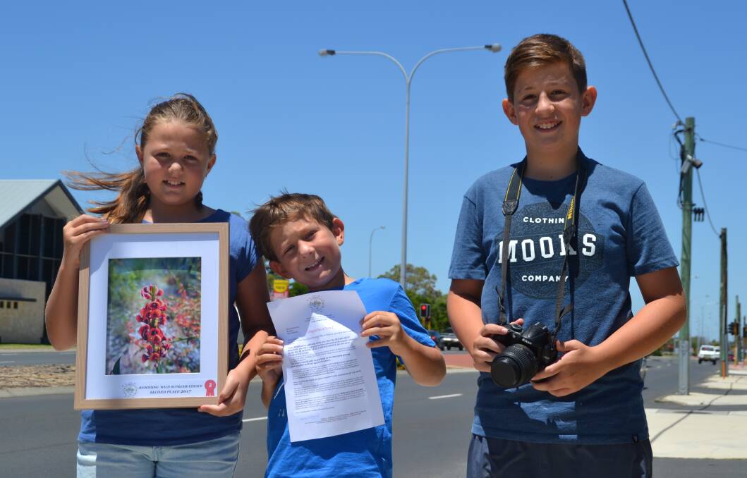 Happy snappers: Indiana, Izaak and Cameron Gee recently impressed in the Kids With Cameras Fun Foto  program. Photo: Thomas Munday. 