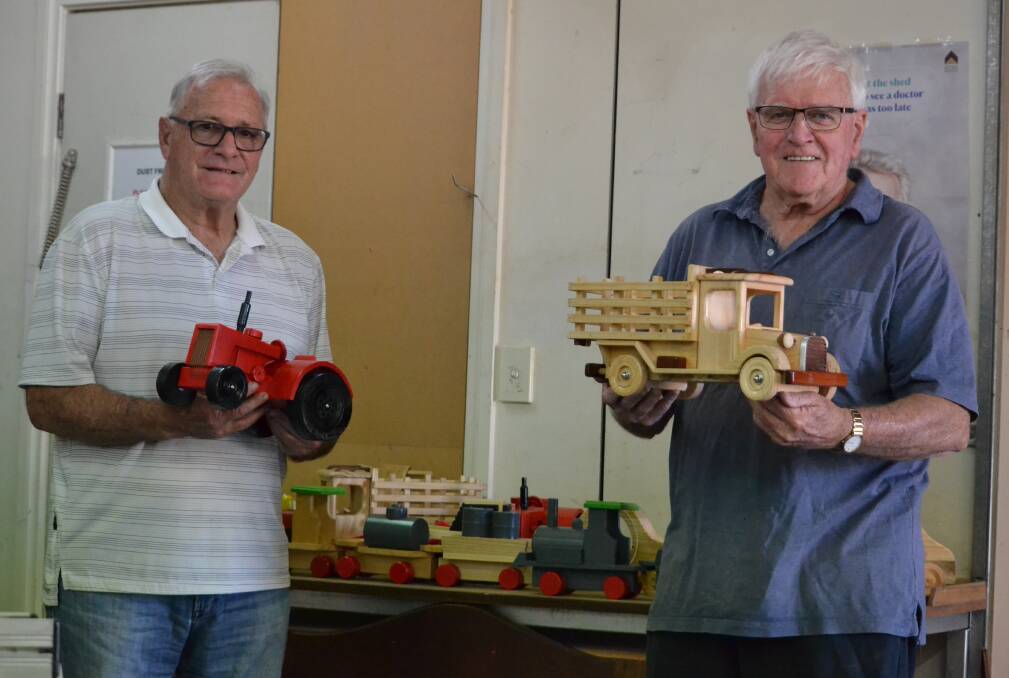 Fun times: Bethanie Fields Village Men's Shed secretary Glen Thompson and president Bruce Thorpe will be on hand to help showcase the group's collection of works this weekend. Photo: Thomas Munday. 