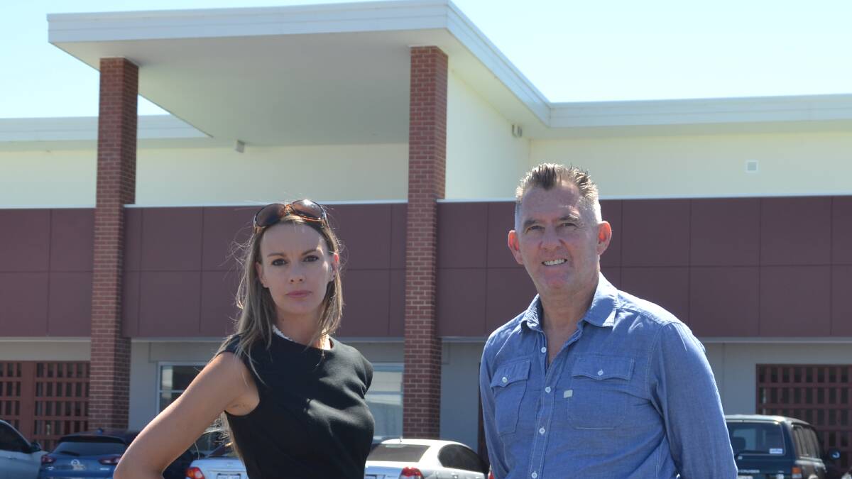Plan scrapped: Jane Taylor and John Miller outside the formally proposed Zero to Three Child Development facility in the Treendale Shopping Centre district. Photo: Thomas Munday. 