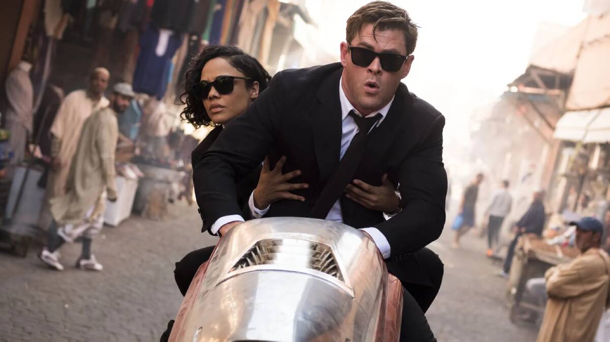 At the movies: Tessa Thompson and Chris Hemsworth headline action-comedy Men in Black: International, in cinemas now. Photo: Supplied. 