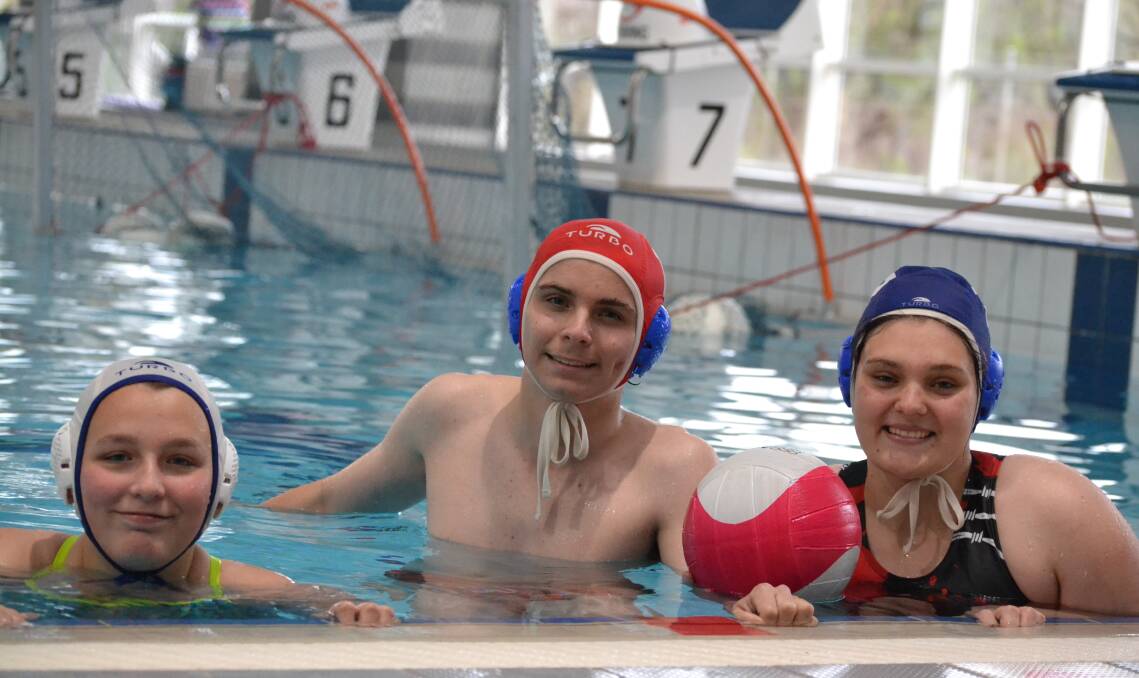 In the pool: Bunbury Water Polo's Kaitlin Ferguson, Isaac Dowdell, and Jazmine Ward. Photo: Thomas Munday. 