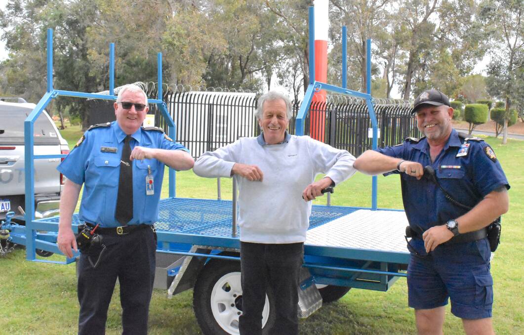 Giving back: Bunbury Regional Prison assistant superintendent Shane Dowell, Disabled Surfed Association - South-West president Ant Pursell, and BRP VSO trade instructor Greg Adams. Photo: Thomas Munday. 