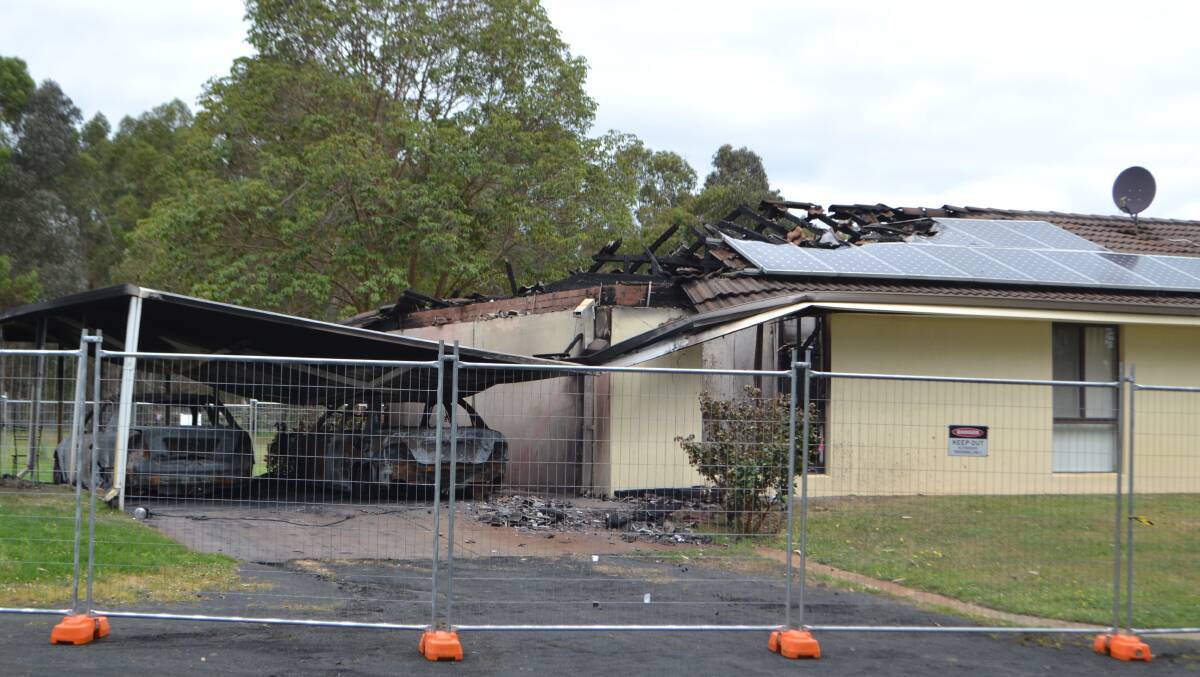 This house in Layman Road, Capel was cordoned off following a blaze on Friday morning. Photo: Thomas Munday. 