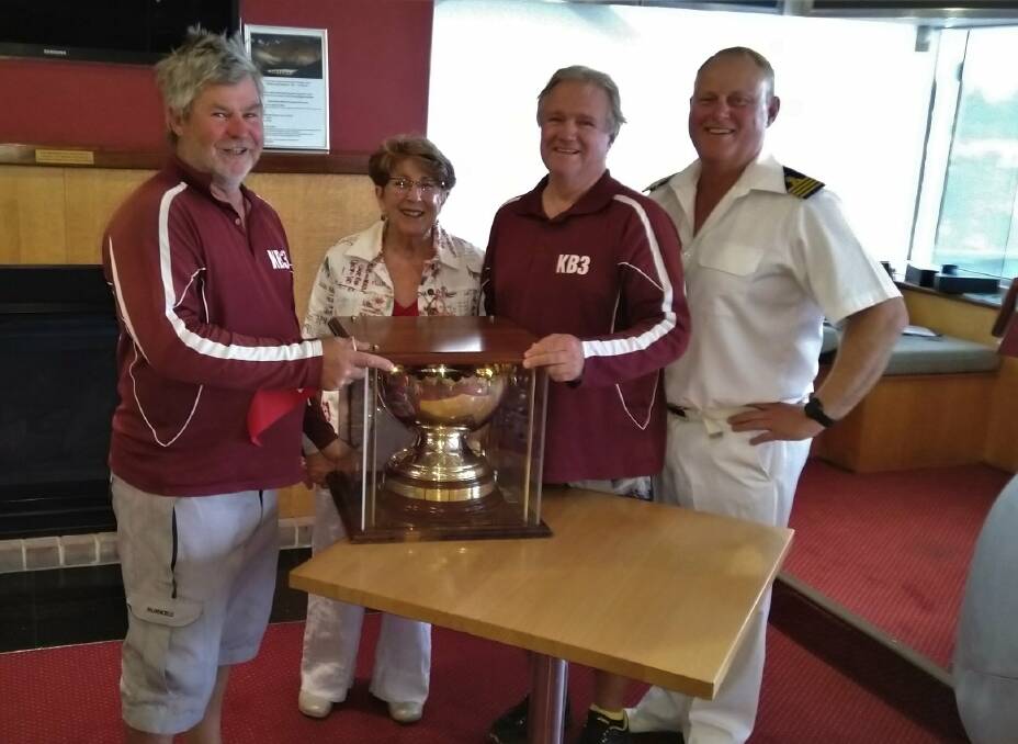 All Smiles: Skipper Phil Slee with Cleve Armstrong, Diane Airey, and RPYC Commodore Mark Hansen. Photo: Supplied. 