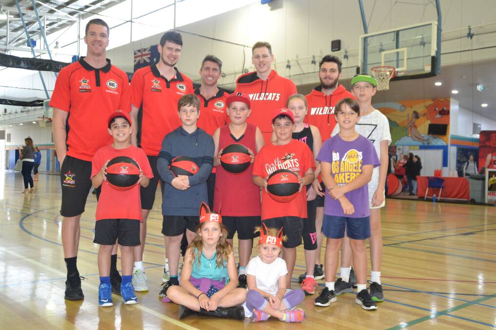 Shooting hoops: Five stars from the Perth Wildcats (Damian Martin, Lucas Walker, Clint Steindl, Jesse Wagstaff and Rhys Vague) trained young basketball hopefuls in Bunbury during the school holidays. Photo: Thomas Munday. 