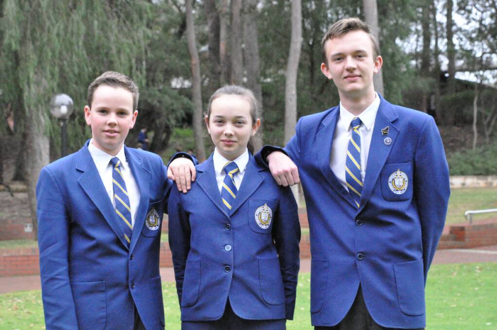 Heads held high: Students Tom Coates, Claudia Waddingham and Jamie McGregor were proud of their Australian Mathematics Competition results. Photo: Thomas Munday. 