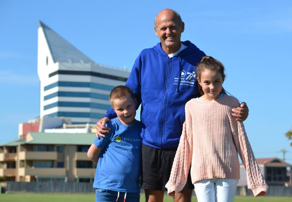 Family pride: Bravehearts 777 Marathon participant Steven Rice with his grandchildren, Jayden Lawson (7) and Mya Lawson (9). Photo: Thomas Munday. 