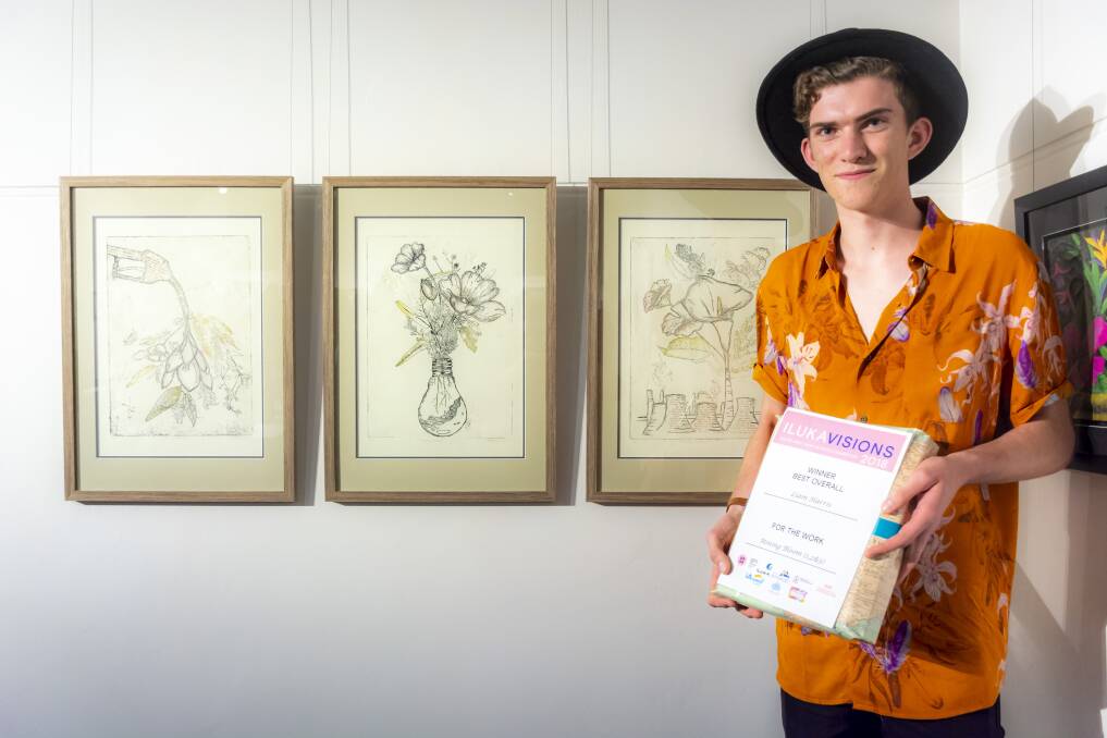 Iluka Visions' victor Liam Harris next to his work, Mining Bloom. Photo: Supplied. 