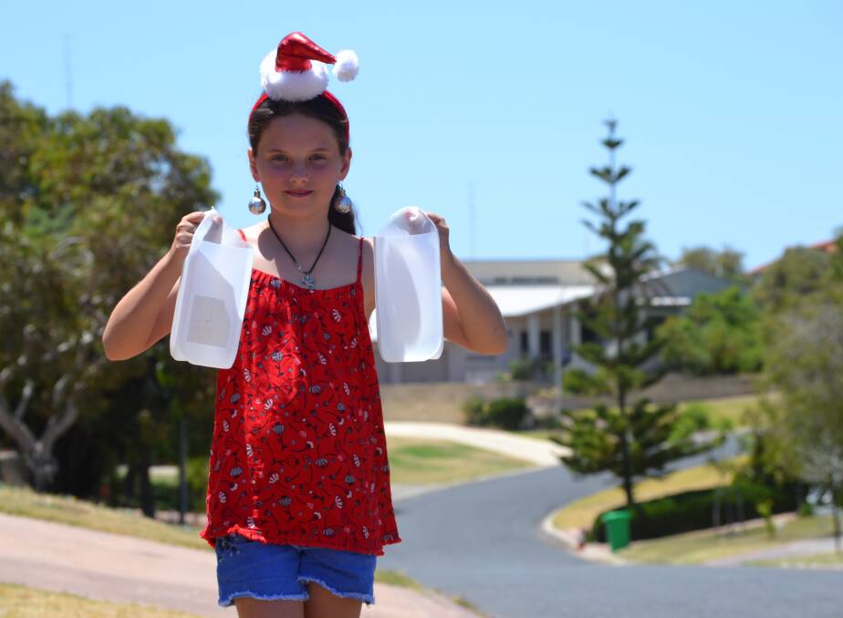 Spreading Christmas cheer: Resident Lily Cresswell, 11, is looking forward to the annual Dunstan Street lantern festival, beginning on December 22. Photo: Thomas Munday. 