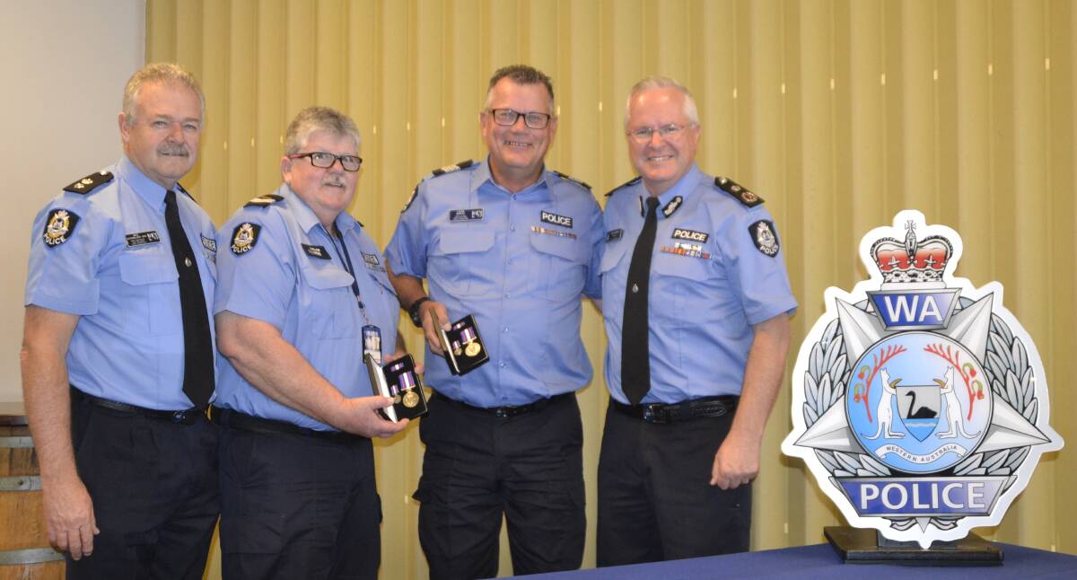 Proud: South West Superintendent Mick Sutherland, Harvey Police Station Officer in Charge Laurie Morley, Police Prosecutor Senior Constable Karl Rep, and WA Police Commissioner Chris Dawson. Photo: Thomas Munday. 