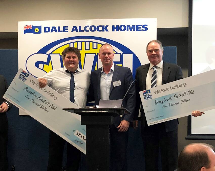 Celebration: Busselton Football Club president Michael Osborn with Dale Alcock Homes South West general manager Steve Hancock and Donnybrook Football Club president Peter Hearman. Photo: Supplied. 