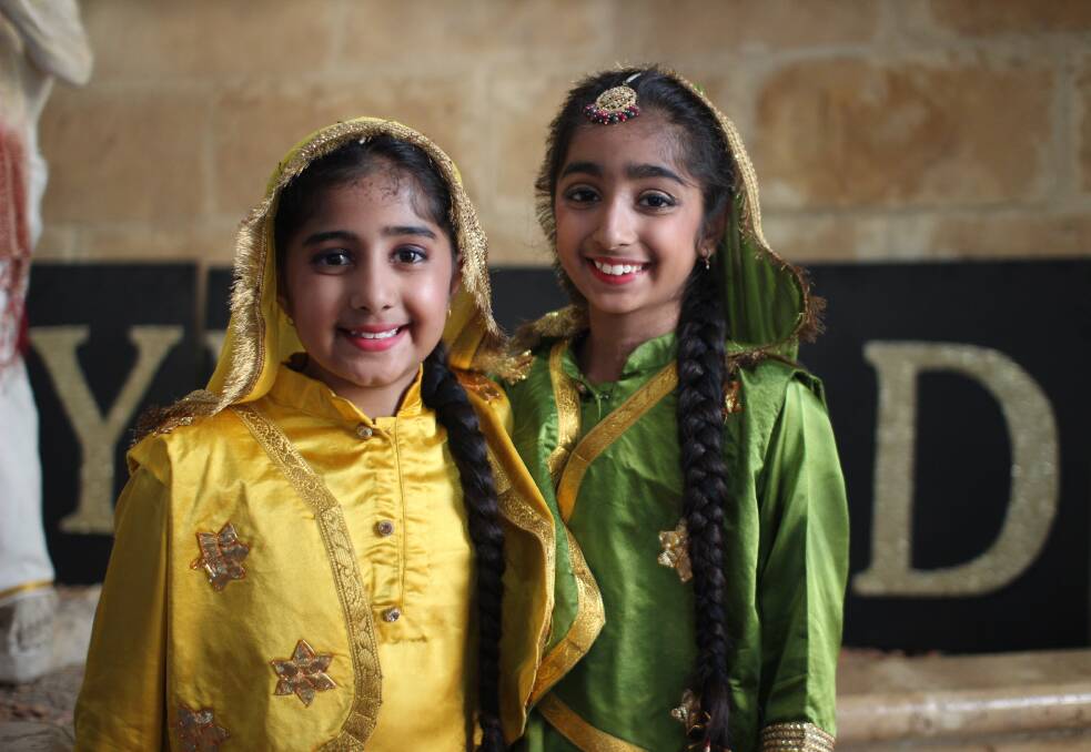 Sister act: Talented young dancers Harnoor Chhabra, 8, and 10-year-old sister Gurnoor Chhabra after their performance. Photo: Jesinta Burton.
