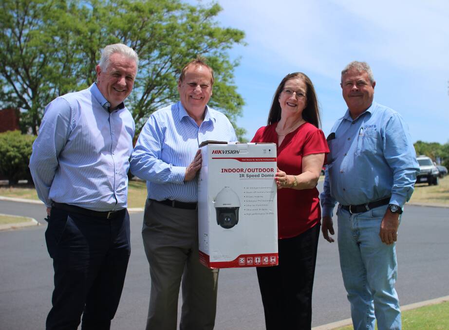 Smile for the camera: Bunbury-Geographe Chamber of Commerce and Industry chief executive officer Mark Seaward, Bunbury MLA Don Punch, SWDC Finance and business analyst and working group member Gayle Gray and Better Telco Solutions director Brian Davies. Photo: Jesinta Burton.