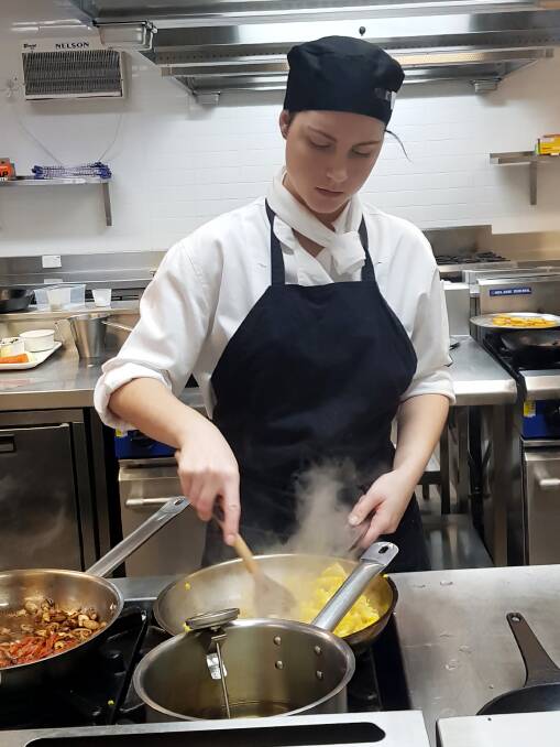 Plan your training: Commercial cookery student Stephanie Humphries in the Epicure Restaurant training kitchen at the Bunbury campus.