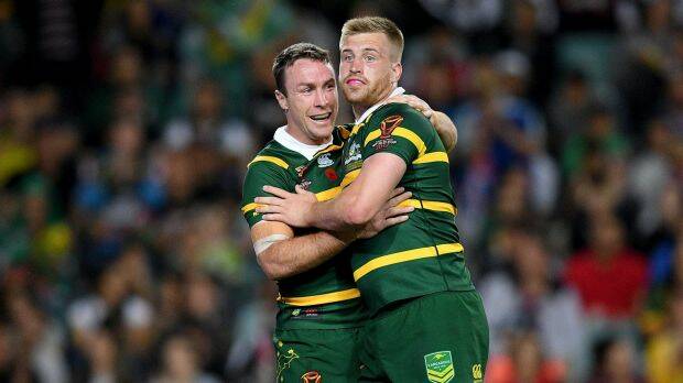 Easy win: Cam Munster, right , and James Maloney were among the tryscorers. Photo: AAP