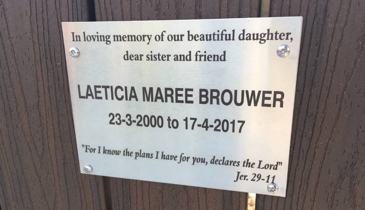 Honoured: A plaque containing Laeticia's favourite scripture, etched in metal, at the entrance to the new memorial at Singelton Beach. Photo: Supplied.