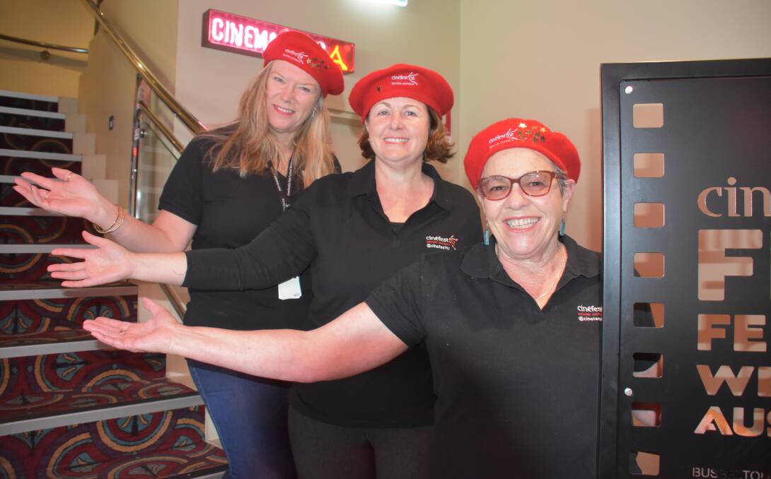 CinefestOZ movie crew officer Wendy Clutterbuck with movie crew volunteers Michelle Reilly and Alannah Gannaway.

