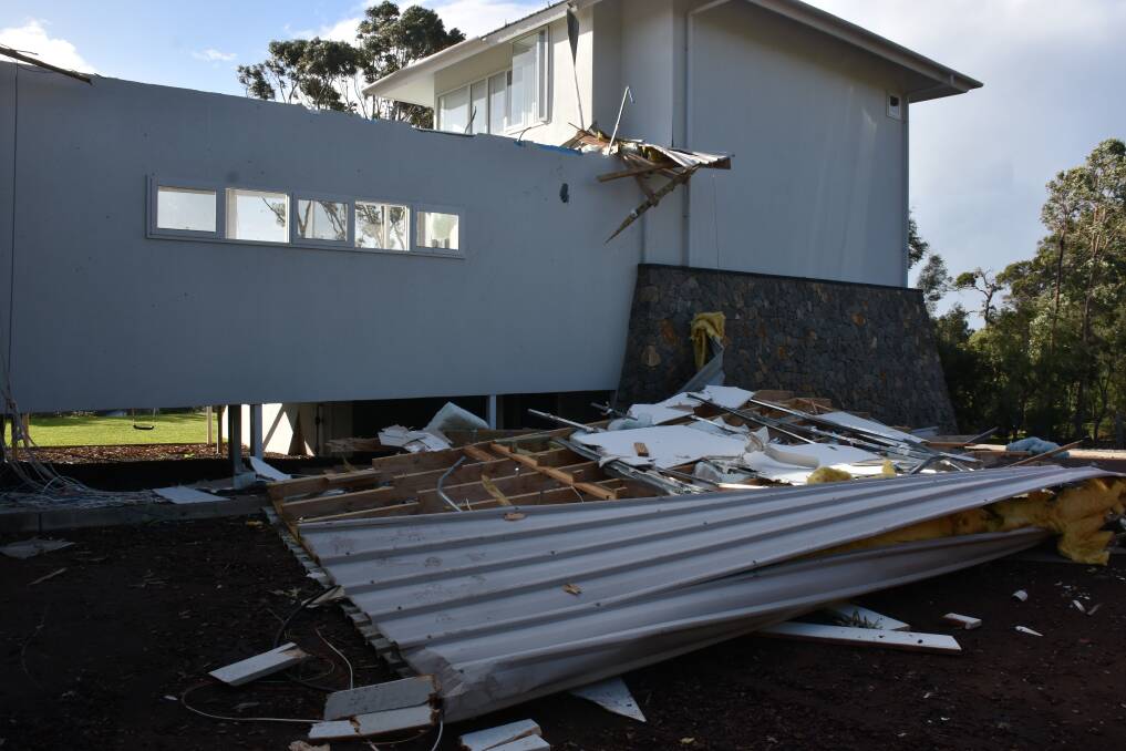 Eagle Bay home loses roof in storm