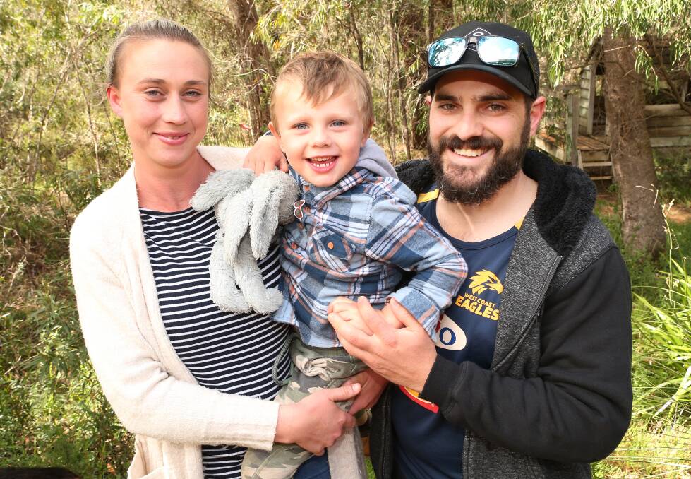 Michelle Buckley, James, Chris O'Reilly were reunited on the evening of September 19, 2020 after three-year old James was missing in bushland in Yallingup for around 12 hours. Image supplied.