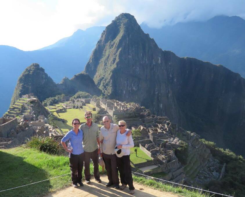Off the beaten track: Kath and Dean Lawrence and David and Joy Agnew at Machu Pichuu ahead of their jungle trek. Photo: contributed.