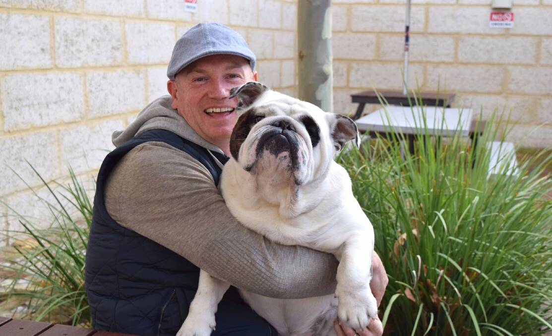 Goodbye: Former Crown Collie publican Mark McCarthy with his dog Oscar. Photo: Shannon Wood. 