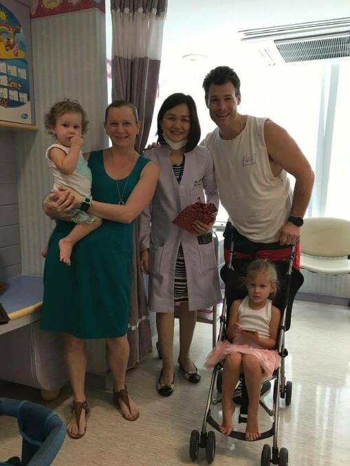The Marshall family with one of the doctors that dealt with Amarli during their stay in a Bangkok hospital. 