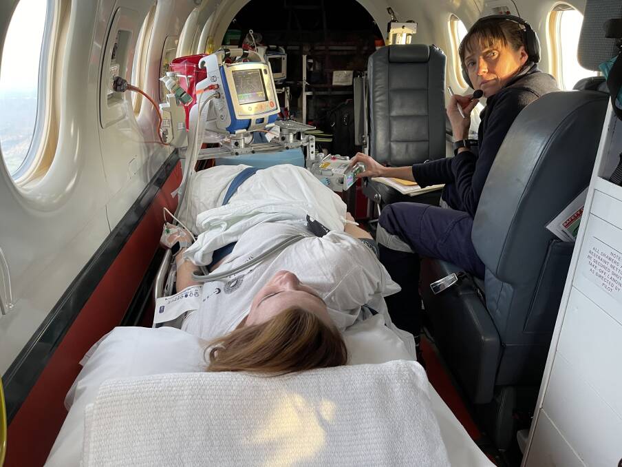 Unique birth experience: Annalise Crowdy flying to hospital with nurse Fiona Yard. Photo: Supplied.