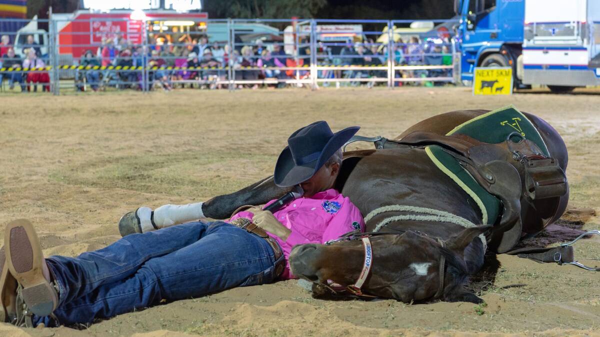 Lying down on the job? Just part of the entertainment at the Cunnamulla Fella Festival.