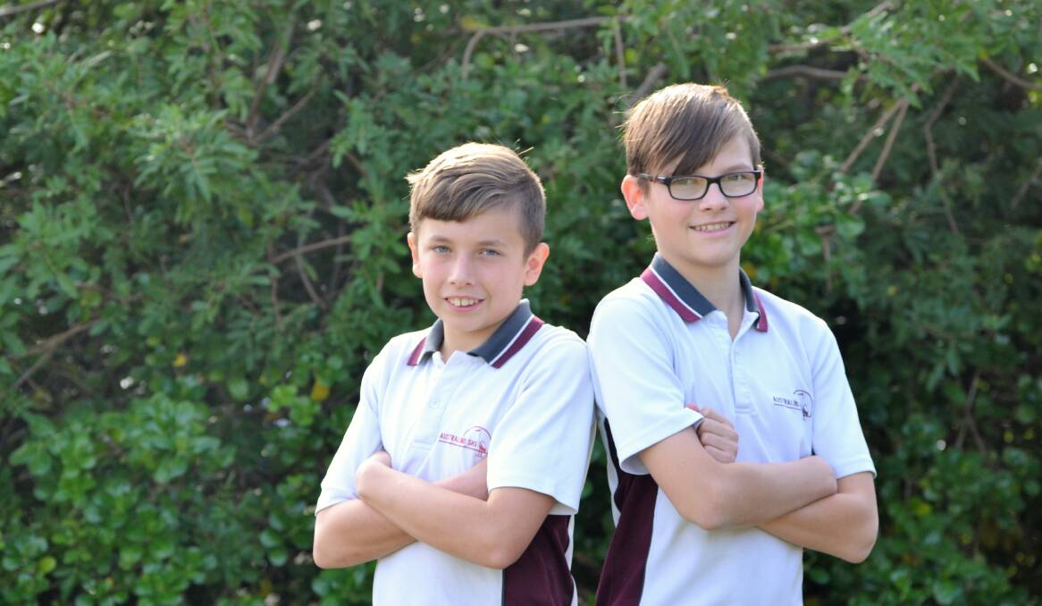 Maths in Motion: George Gallagher, 12, and Cameron Kelly, 13, are ready to take on the world this week. Photo: Emily Sharp. 