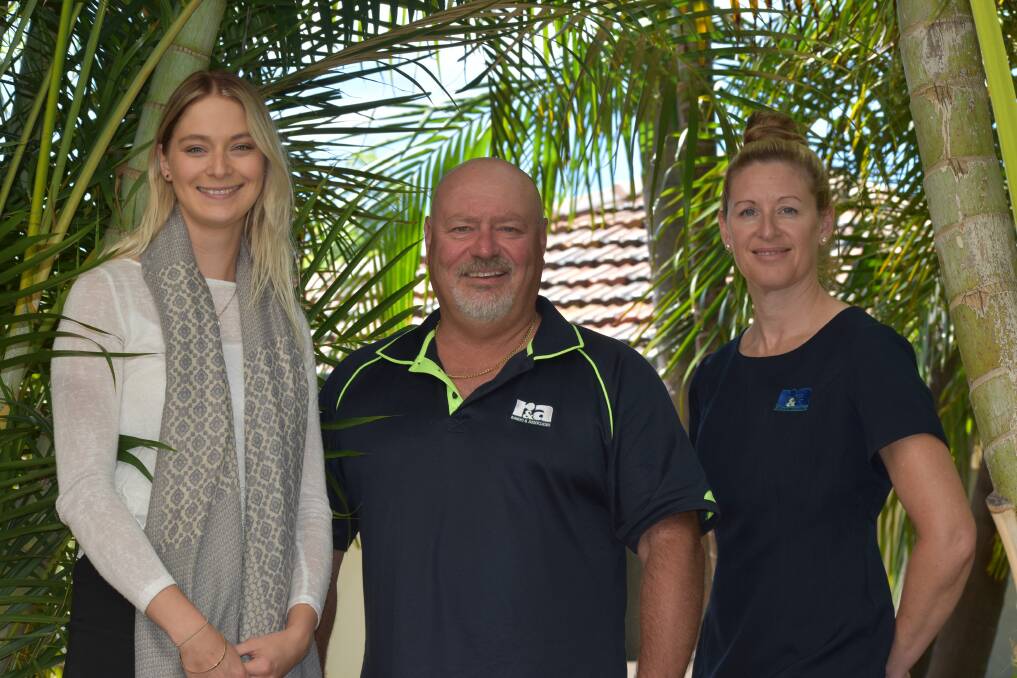 A generous donation: Cancer Council Western Australia South West regional education officer Shenae Norris with Rando and Associates director Mark Rando and client services officer Tanya Farnsworth. Picture: Emily Sharp.