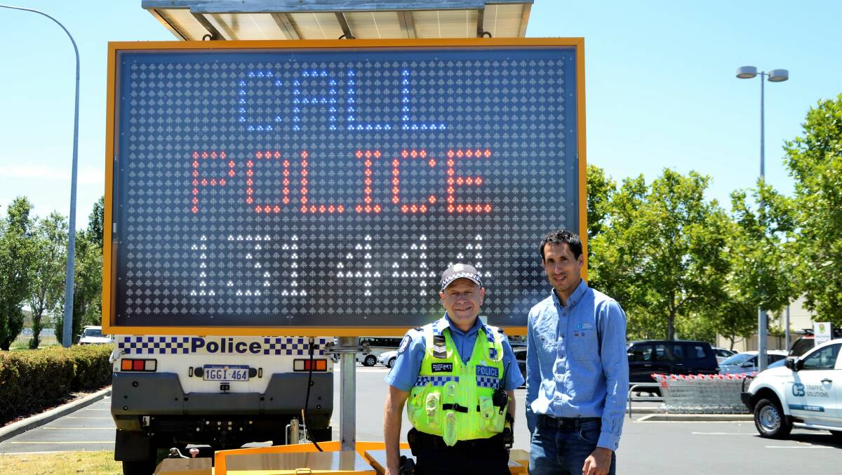 Safety first: South West Community Engagement Senior Constable Neale Horsley with CB Traffic Solutions Joel Rebello. Photo: Emily Sharp. 