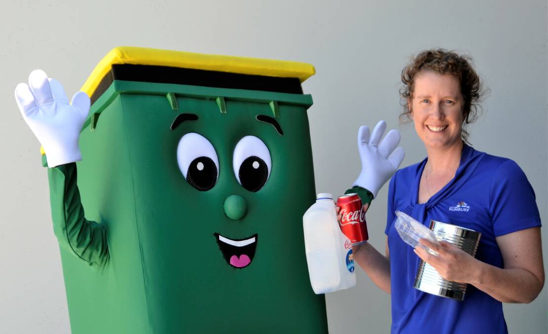 Putting things in the bin: City of Bunbury's Reggie the recycling bin with waste education officer Jo Walker. Photo: Emily Sharp.