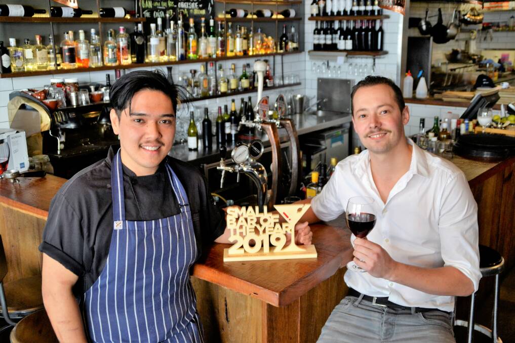 Raising the bar: Yours or Mine head chef Leo Nakamura and venue manager Dennis Rutten toast their success. Photo: Emily Sharp. 