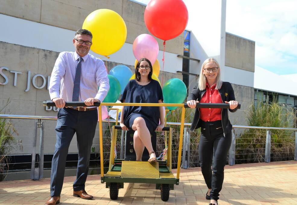 The Great South West Bed Race: St John of God Bunbury Hospital chief executive Mark Grimes with the Great South West Bed Race organisers Kristy Cochrane and Lizzie Gaffney. Photo: Emily Sharp.