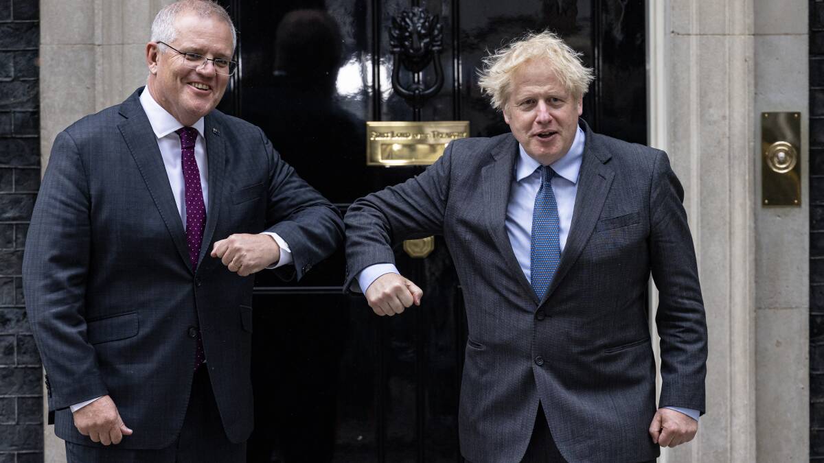 Scott Morrison and Boris Johnson hammered out details at Downing St. Picture: Getty