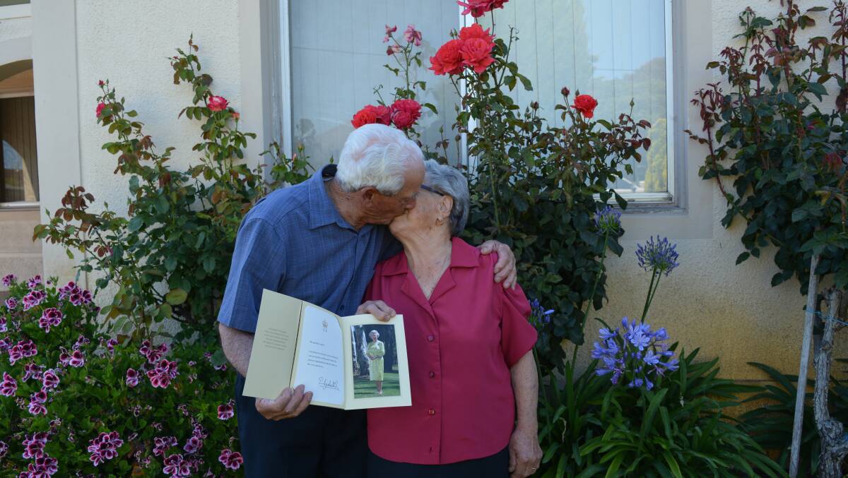 Antonio and Michelina Castrilli with their letter from the Queen congratulating them for 70 years of marriage.
