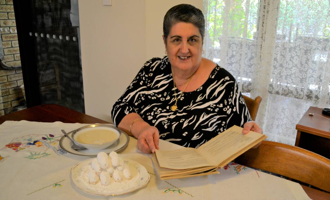 Vicki Fryer cooks her kourabiethes using a recipe from a Greek cookbook which was gifted to her by her aunt in 1978. 