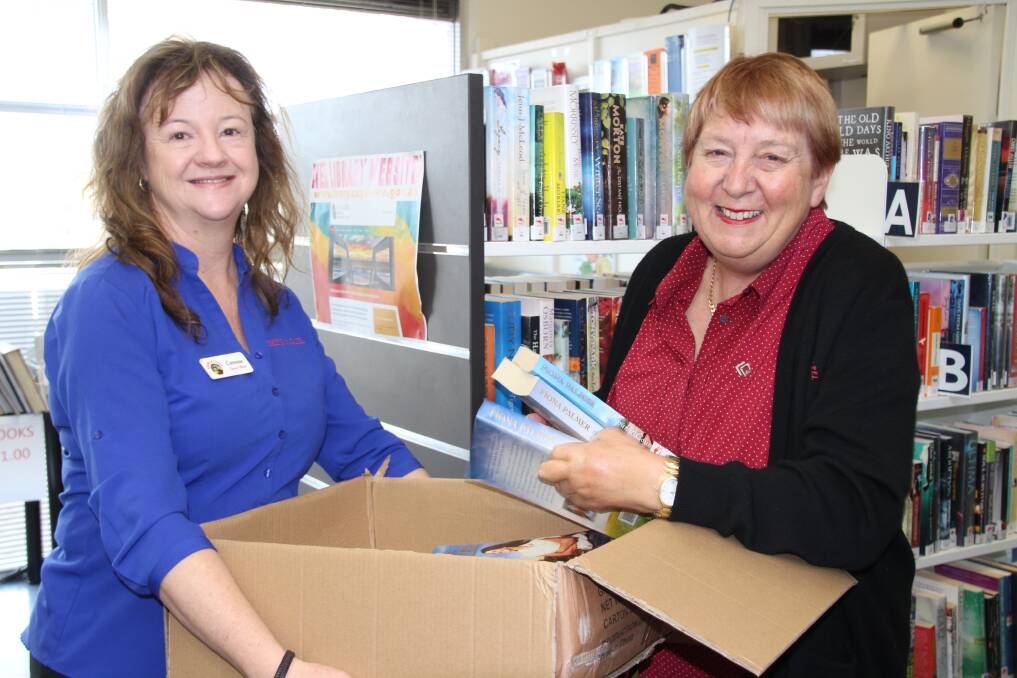 Shire of Capel Library officers Corenne Lynn and Linda McIntyre start packing for the move to the new Dalyellup Library. Photo: Chloerissa Eadie.