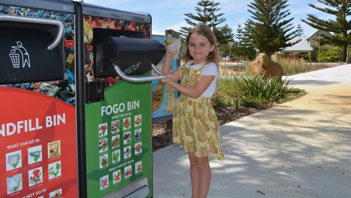Mayah Russell is using the FOGO bin while enjoying a barbecue at Sykes Foreshore.
