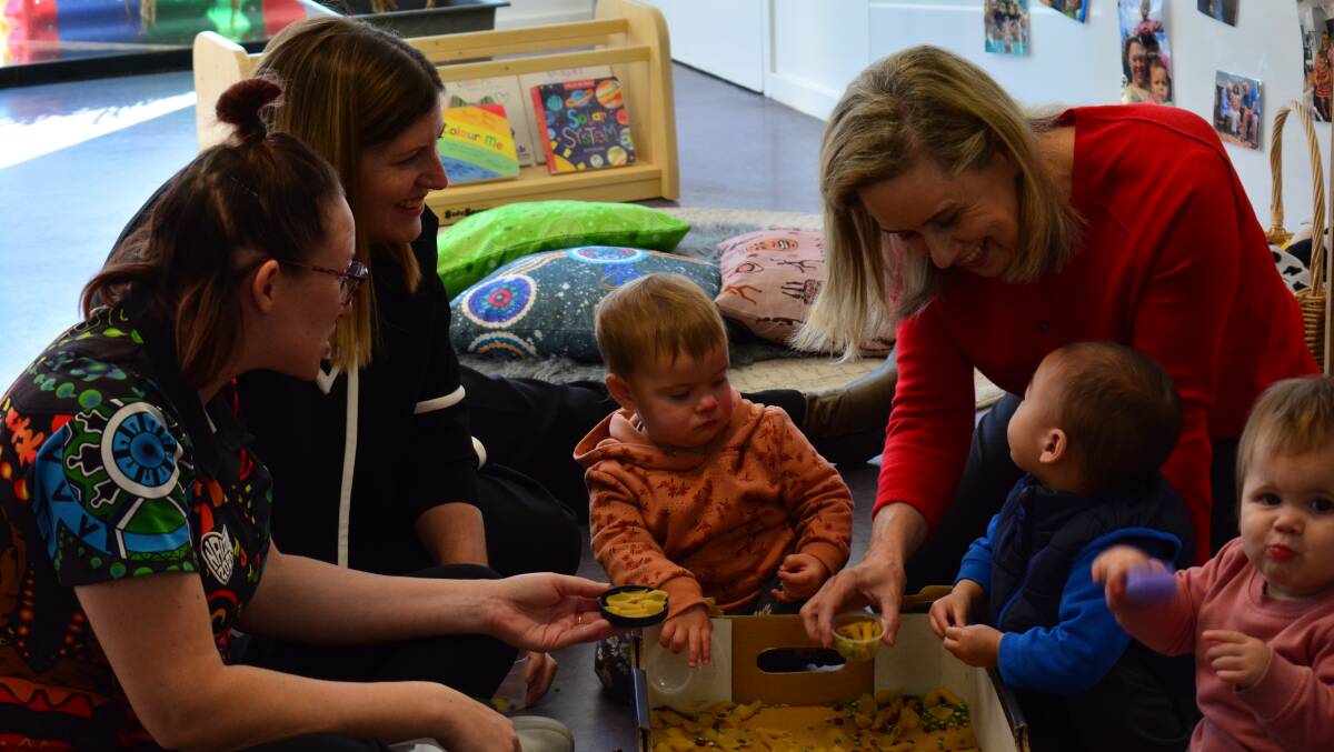 Collie-Preston MLA Jodie Hanns and community services minister Simone McGurk with children at the Goodstart Early Learning Centre in Eaton. Picture: Jemillah Dawson