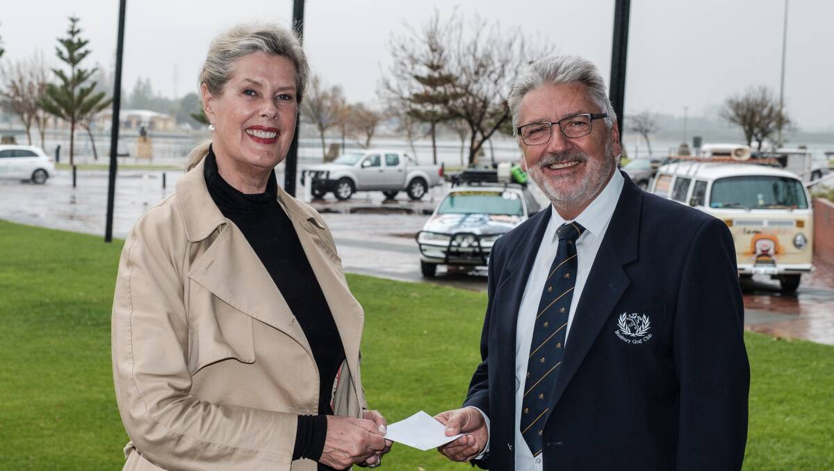 Camp Quality chief executive officer Deborah Thomas with Bunbury Golf Club president Rob Littlewood. Picture: supplied.