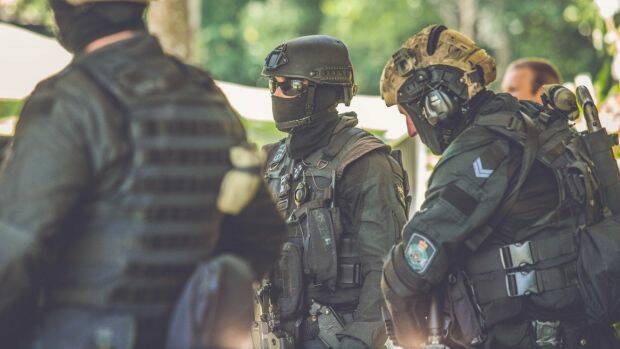 Police sent in a Special Emergency Response Team (pictured in a training exercise above) after the fatal shooting west of Brisbane. Photo: File image / QPS / Kalinda Photography